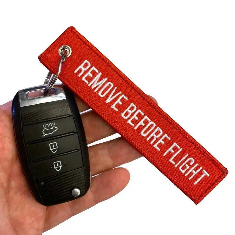 Nyckelband - REMOVE BEFORE FLIGHT - Röd/Vit - Action King