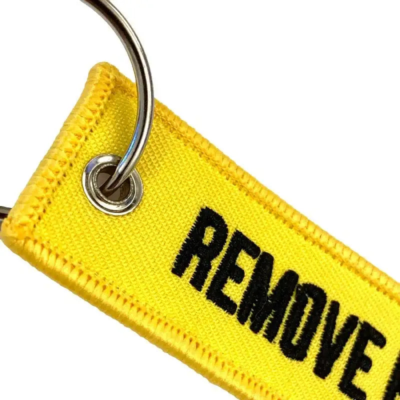 Nyckelband - REMOVE BEFORE FLIGHT - Gul/Svart - Action King